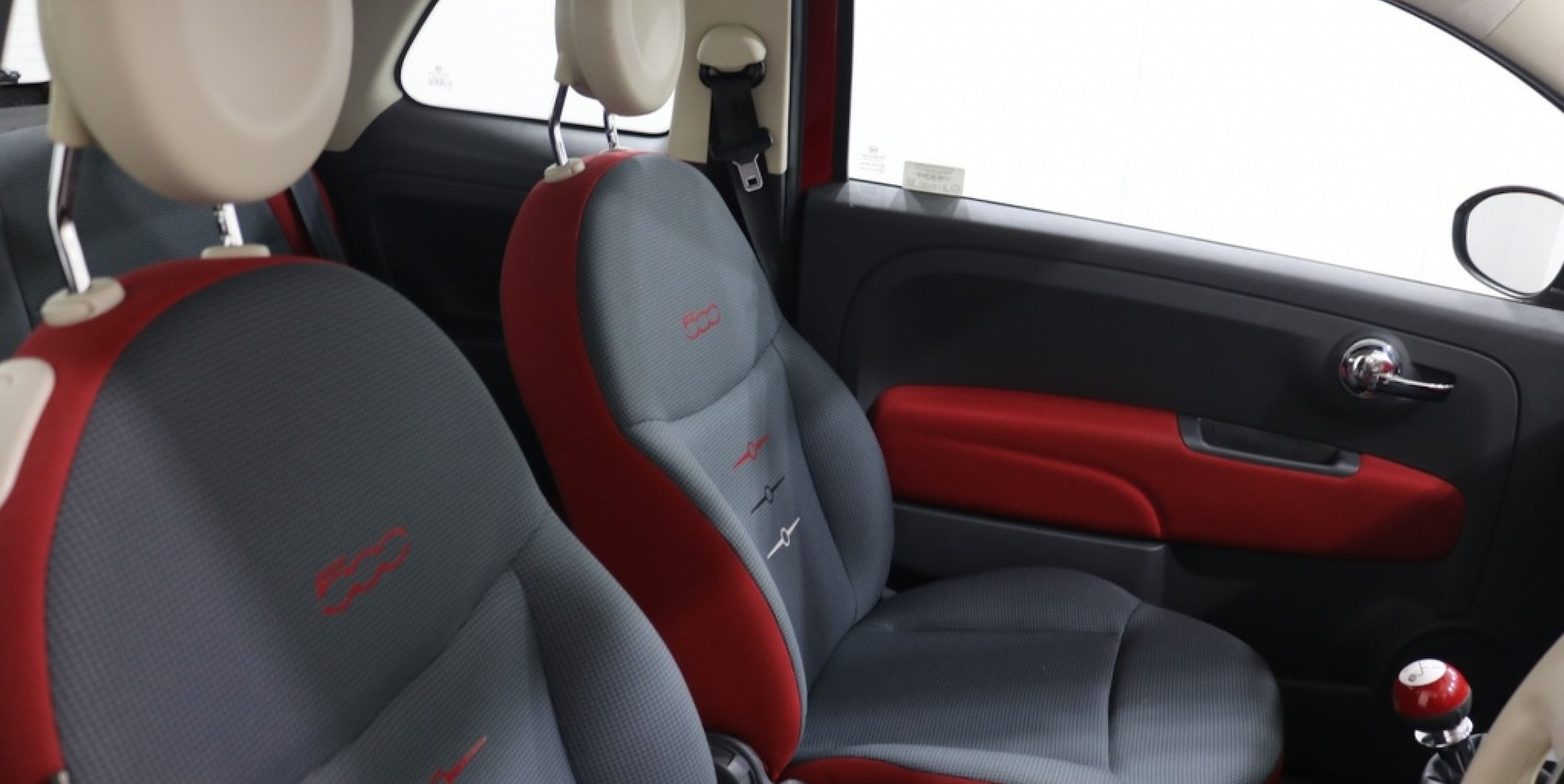 Fiat 500 front interior with red trim 